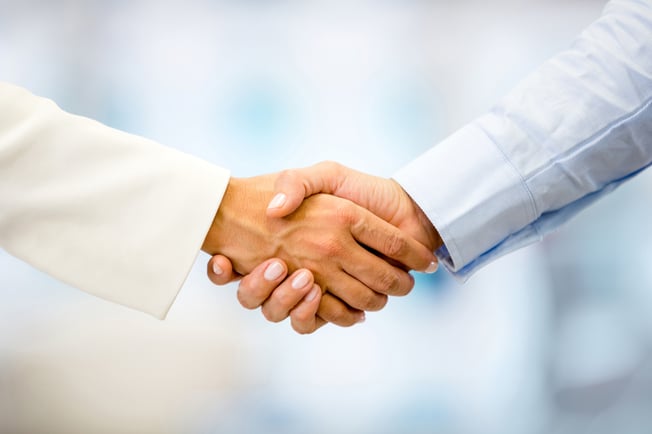 Successful business people handshaking closing a deal-4